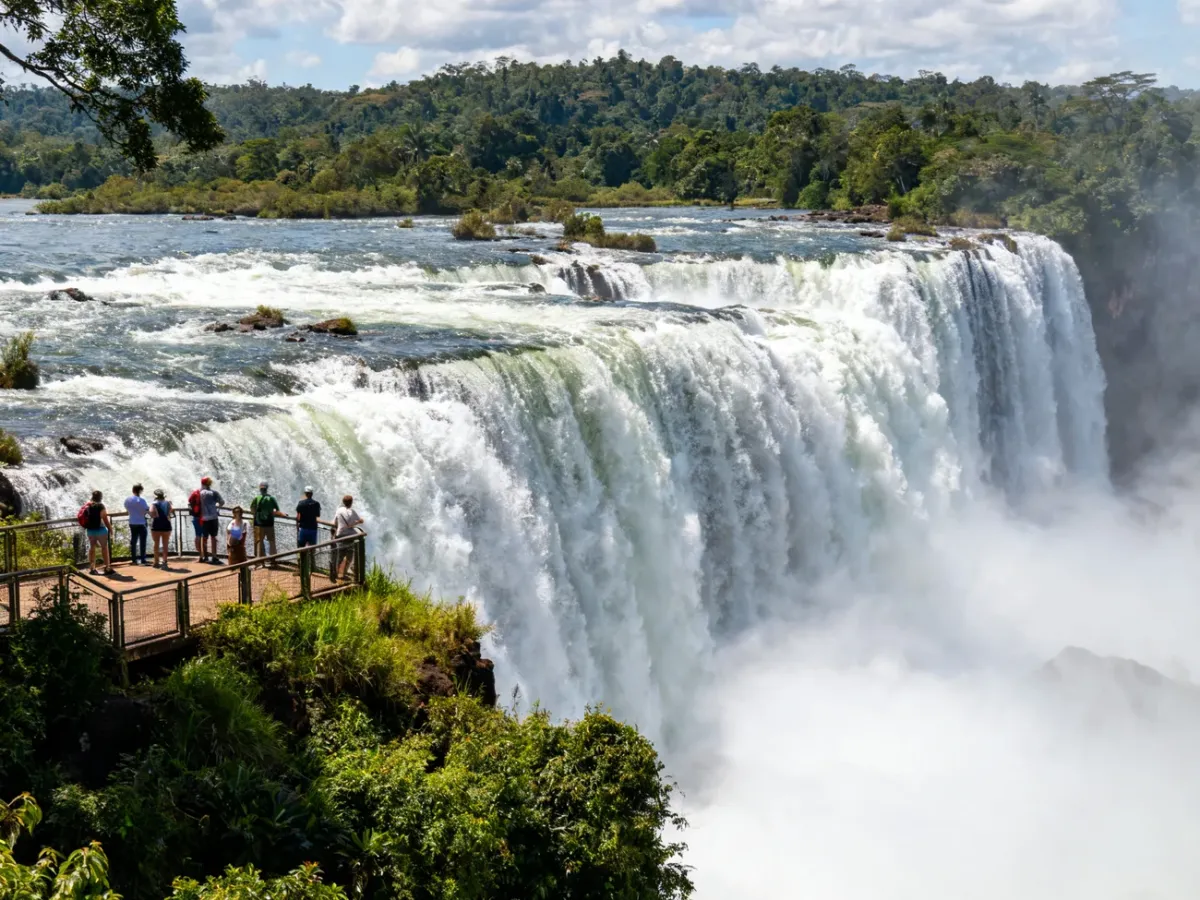 Visitors viewing the wide Brazilian panorama of Iguazu Falls