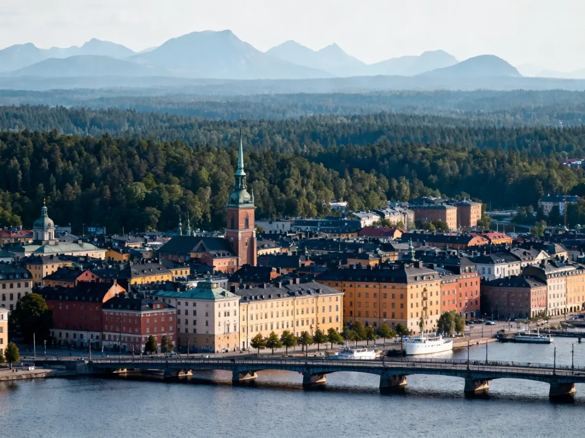 Panoramic view combining Stockholm’s historic waterfront with Sweden’s vast Nordic landscape
